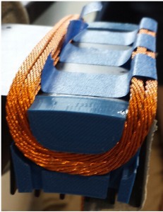 Figure 15: Single-phase armature test winding using a 49-strand Litz wire and a 3-D printed winding frame (shown in blue)